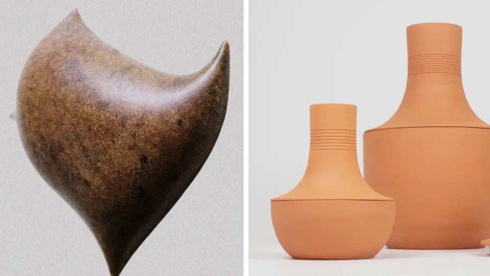 a softly carved stone next to terracotta pots. Photo composition. 