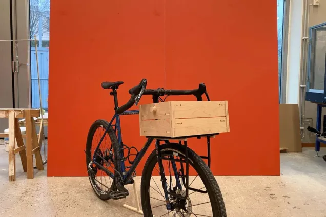 wooden bike basket mounted on a bike