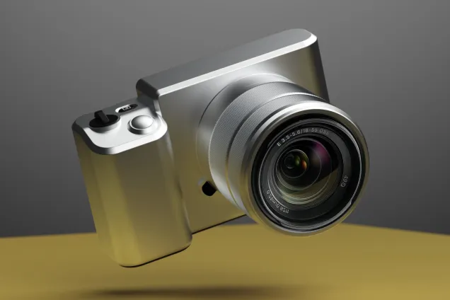 a silver colored camera floating above a surface. 3D-render. 