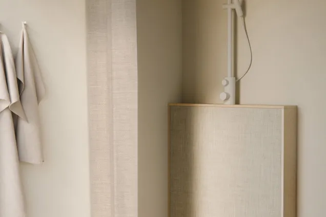 a rendering of a shower in the corner of a room.