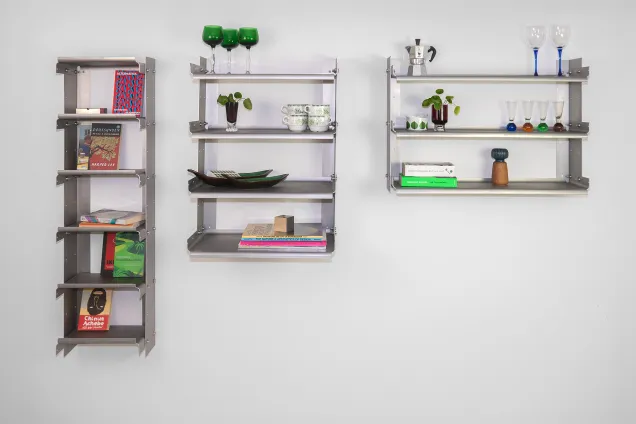 three wall shelves of varying proportions.