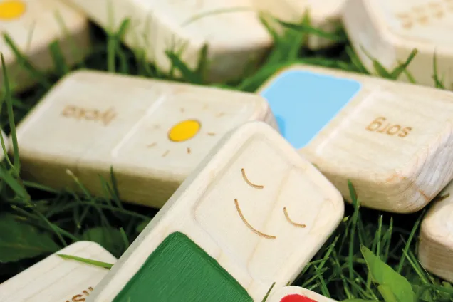 domino-like tiles with different mood symbols. 