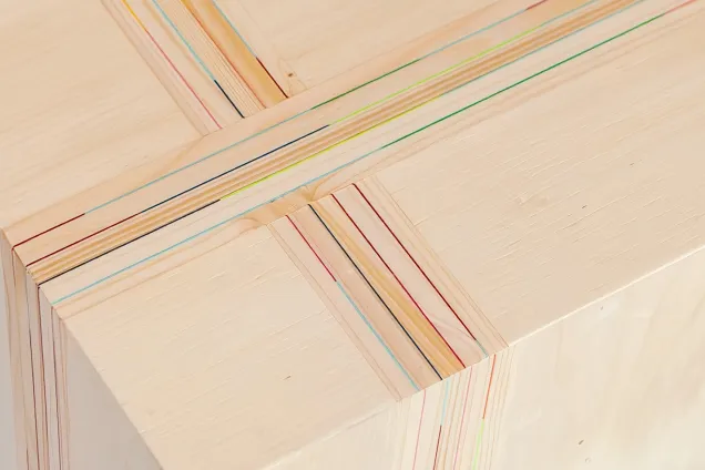 wooden object with wood panel edges making a pattern.