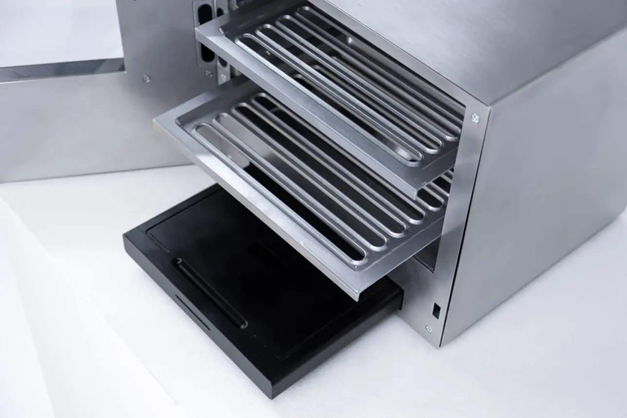 different metal trays in the cooker