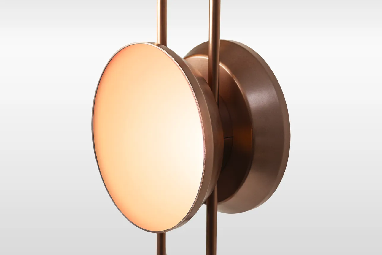 Backlight of a speaker system glowing orange. Photo.